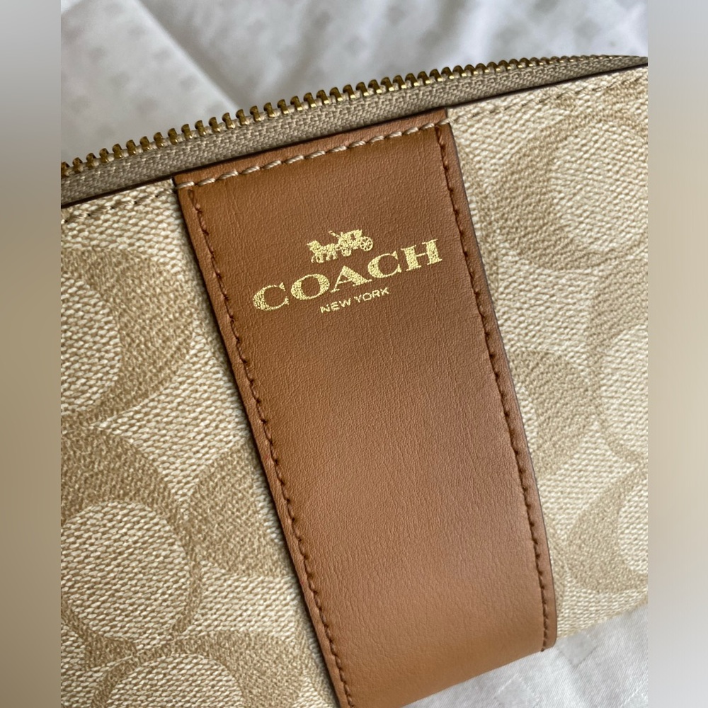 Coach Corner Zip Wristlet in Signature Canvas Light Khaki and Light Saddle trim